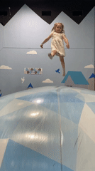 Children play on indoor inflatable structure in Izhevsk
