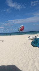 Beach activities including parasailing, wedding, volleyball in Playa del Carmen