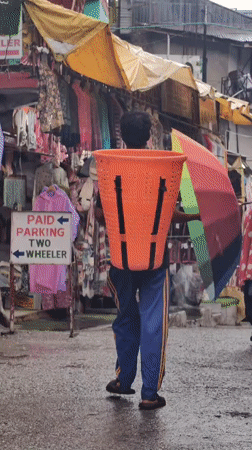 Vashisht after rain: swollen river, misty peaks, quiet streets