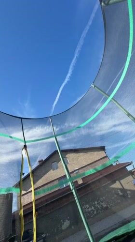 Everyday moments captured in Bulgarian village: trampoline views, haircut