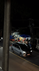 Evening dining and vendor activities documented in Baturiti, Indonesia