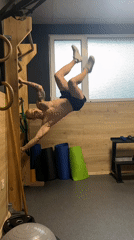 Tattooed athlete performs calisthenics workout at Pleven gym