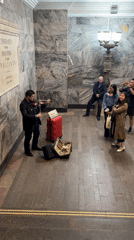 Street violinist performs in Moscow metro station