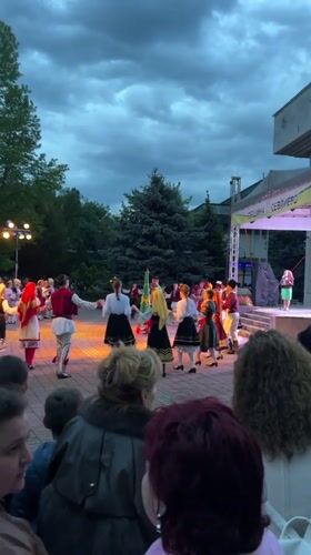 Traditional folk dancers perform at outdoor cultural event in Sevlievo