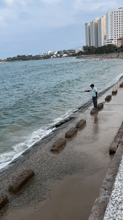 Morning life unfolds in Vietnamese coastal district