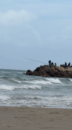 Morning beach activities captured at Kiryat Yam Mediterranean shore