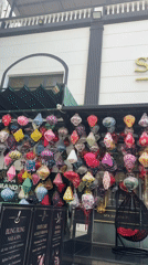 Colorful lanterns displayed on spa building facade in Đà Nẵng