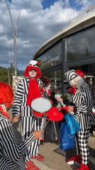 Costumed parade with clowns, Vikings proceeds through Budva streets