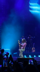 Live concert in Belgrade: guitarist with dreadlocks rocks the stage