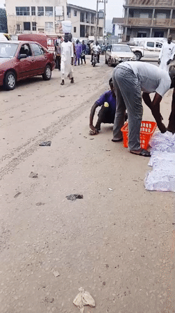 Daily street market activity documented across Abuja neighborhoods