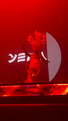 Elaborate stage show at a North Kuta nightclub under red lights