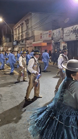 Colorful nighttime parade fills Arica streets with dancers and bands