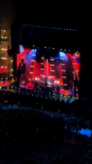 Live concert fills Milan arena with lights and a packed crowd