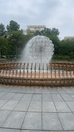Park water features documented in Khabarovsk including fountain and waterfall