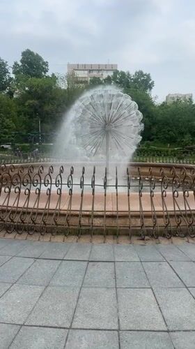 Park water features documented in Khabarovsk including fountain and waterfall