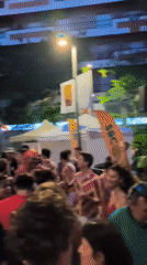 Evening crowd gathers at outdoor Barcelona market event