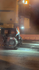 Nighttime road construction work documented in Moscow