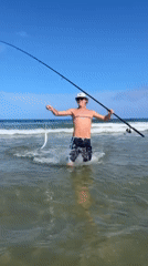 Early morning fishing success and beach socializing at Bulli