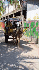 Early morning street life captured in Indonesian tourist area