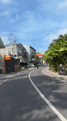 Daytime road footage captured in North Kuta, Indonesia