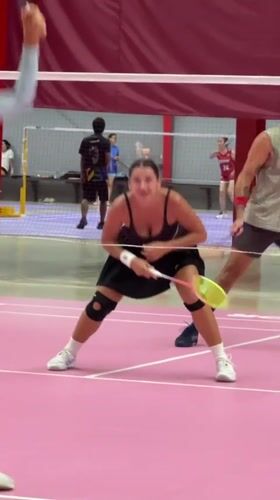 Indoor badminton on a pink court in Ko Samui