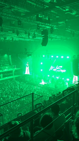 Female singer performs evening concert in Ufa arena venue