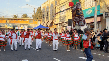 Traditional street parade with folk dancers unfolds in Tacna