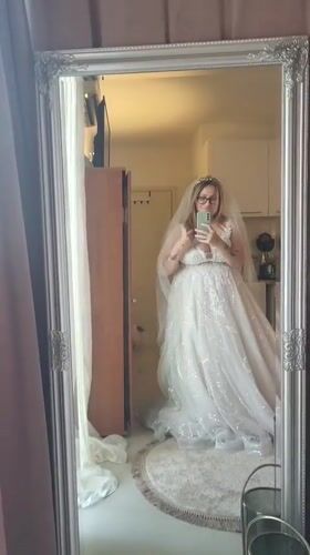 Bride takes mirror selfies in wedding dress, Montenegro