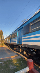 Train crosses railway barrier in Wilde, Argentina