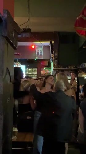 Late night dancing and singing at Alexandria bar
