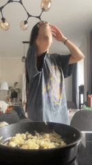 Woman prepares meal in Moscow-area kitchens Thursday morning