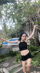 Women film outdoor video content in Mengwi garden