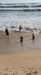 Sunny morning beach activity recorded at Kuta Selatan, Indonesia