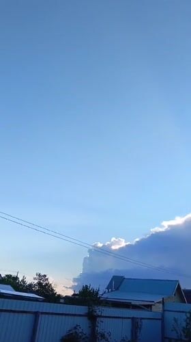 Backlit cloud formation observed over residential Nevinnomyssk, Russia