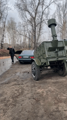 Man operates military field kitchen trailer in Krasnoyarsk