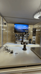 Robotic barista operates behind glass at Moscow coffee shop