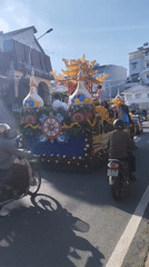 Religious float procession moves through Da Lat streets