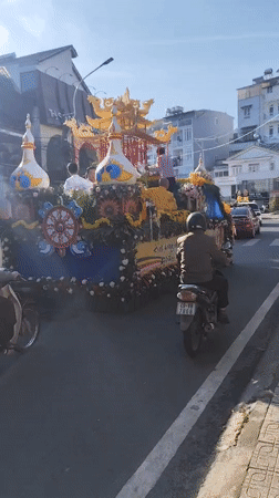Religious float procession moves through Da Lat streets