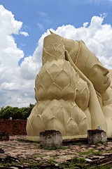 Ayutthaya's ancient ruins and reclining Buddhas on a clear morning