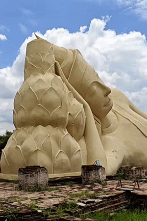 Ayutthaya's ancient ruins and reclining Buddhas on a clear morning