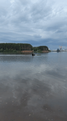 Early morning fishing session documented near Chaikovsky industrial waterfront