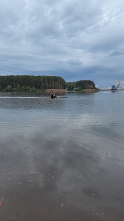 Early morning fishing session documented near Chaikovsky industrial waterfront