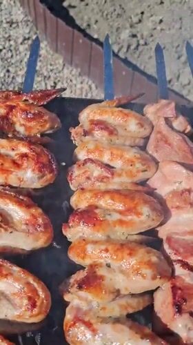 Morning barbecue session in Irkutsk features chicken wings and kebabs