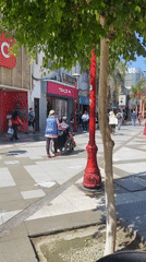 Pedestrians observed on downtown street in Arica, Chile
