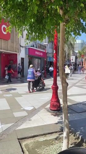 Pedestrians observed on downtown street in Arica, Chile