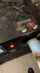 Person recycles glass bottles at Sofia vending machine