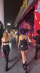 Night walk through a rain-slicked alley in Haizhu District
