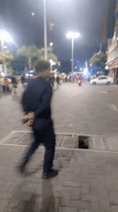 Nighttime street performers draw crowds in downtown Caracas