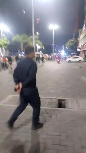 Nighttime street performers draw crowds in downtown Caracas