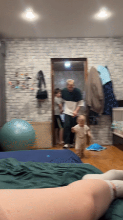Family spending evening together at home in Vesyoloye, Russia